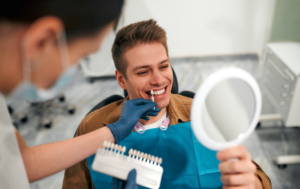 a patient receiving veneers from their cosmetic dentist